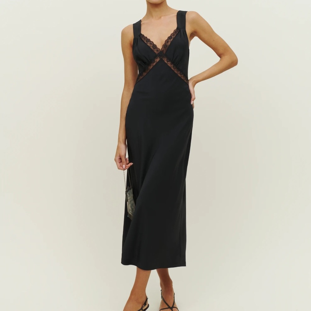 Reformation Provence Dress. Its a size too small .I gained weight